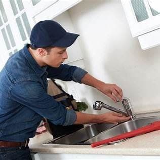 Modern kitchen faucet prepared for professional installation