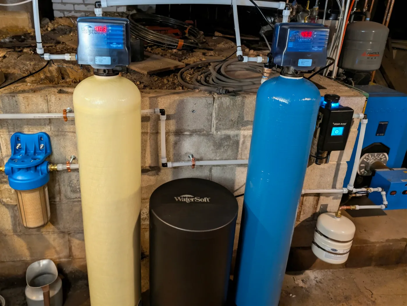 WaterSoft treatment equipment and plumbing installed in a utility space