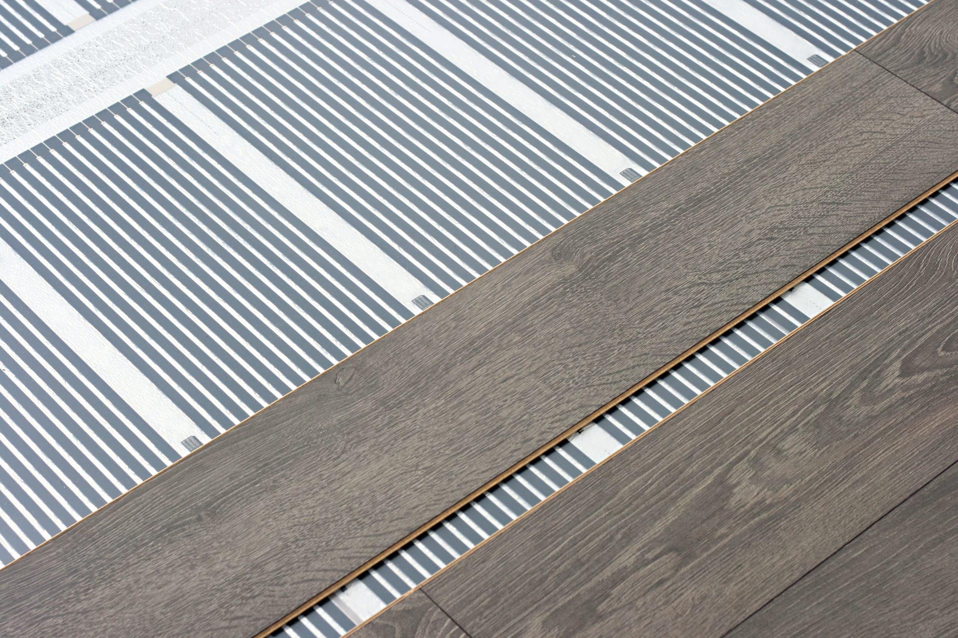 Flooring installed over a radiant heating layer